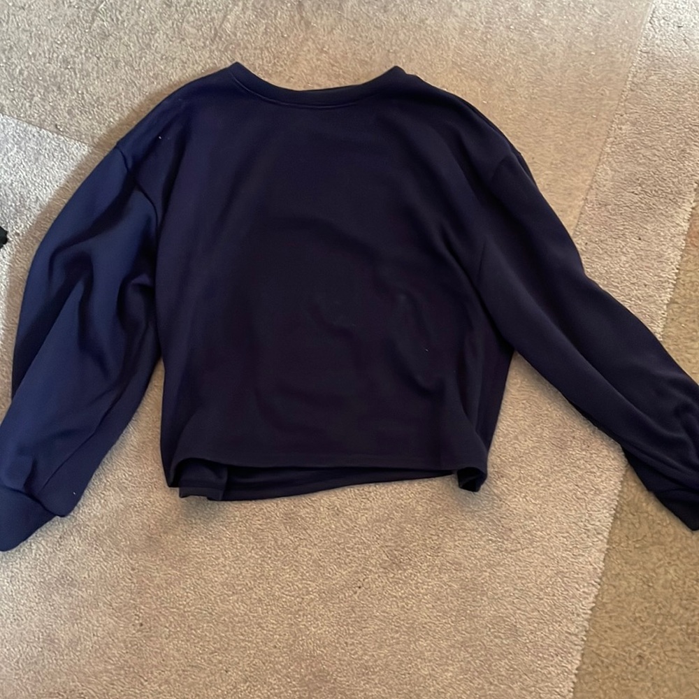 XL but doesn’t fit like a large